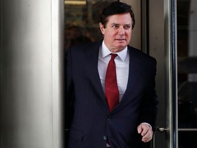 FILE - In this Nov. 6, 2017, file photo, Paul Manafort, President Donald Trump's former campaign chairman, leaves the federal courthouse in Washington. A federal judge in Washington has thrown out a civil lawsuit brought by President Donald Trump's former campaign chairman that sought to challenge the authority of the special counsel in the Russia investigation. The decision was a blow to Manafort's defense against special counsel Robert Mueller. U.S. District Judge Amy Berman Jackson issued the ruling.