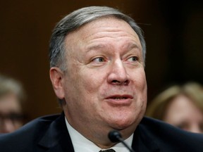In this April 12, 2018, photo, Secretary of State-designate Mike Pompeo speaks during the Senate Foreign Relations Committee hearing on his confirmation on Capitol Hill in Washington. Pompeo, is facing so much opposition from Democrats on the Senate Foreign Relations Committee the panel could be forced to take the unusual step of sending the nominee to the full Senate without a favorable recommendation. He's still expected to have enough votes in the full Senate to replace Rex Tillerson, who was fired by Trump. But his confirmation may come down to a handful of senators.