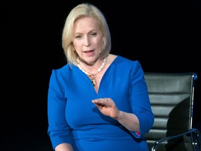FILE - In this April 13, 2018, file photo, Sen. Kirsten Gillibrand, D-N.Y., speaks in New York. One after another, ambitious Democrats attacked President Trump's policies as discriminatory, his rhetoric as hateful and his motivations as bigoted. The fiery rhetoric, from nearly a half dozen senators who may seek the White House in 2020, came as hundreds of African-Americans gathered in New York City to contemplate the first year of the Trump presidency and to begin sizing up his possible replacement. Trump "is what the darkness looks like," said Gillibrand. "He is what the darkness sounds like."