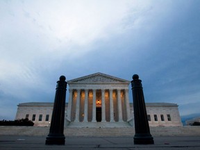 FILE - In this Feb. 1, 2017, file photo, the Supreme Court is seen in the morning in Washington. The Supreme Court has so far had little to say about Donald Trump's time as president. That's about to change. The justices' first deep dive into a Trump administration policy comes in a dispute over the administration's ban on travel from some countries with majority Muslim populations.