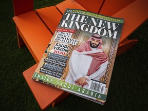 A glossy magazine about Saudi Arabia is photographed in Washington, Monday April 23, 2018. The mystery behind the origins of a the pro-Saudi magazine that showed up on U.S. newsstands is growing amid revelations that the Saudi Embassy in Washington got a sneak peek. The Associated Press has obtained files showing that a digital copy was quietly shared with Saudi officials by American Media Inc. almost three weeks before it was published, despite both parties' insistence that they didn't coordinate on the magazine.