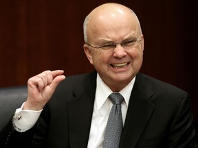 FILE - In this Jan. 15, 2009, file photo, then-CIA Director Michael Hayden gestures during a news conference at CIA headquarters in Langley, Va. The cast of TV's "Homeland" call it "spy camp." It's when they travel to Washington to pick the brains of top U.S. intelligence officials. Members of the cast and crew of "Homeland" appeared April 23, 2018, at the National Press Club to talk about espionage in pop culture. Several hundred people attended the event, which was sponsored by the Michael V. Hayden Center for Intelligence, Policy and International Security at George Mason University.