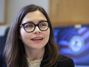 In this April 6, 2018, photo Mary Daly speaks to an Associated Press reporter in her office at the Department of Justice in Washington. Daly has heard the criticism: That the tough-on-drugs approach favored by the Trump administration is cruel, ineffective and a return to the failed policies of the 1980s. She's not buying it. "We need to use tough prosecutions if we are going to get our way out of this epidemic," said Daly, a longtime federal drug prosecutor recently tapped to oversee the Justice Department's ambitious efforts to attack the nation's opioid abuse crisis. "We don't ignore the need for prevention and treatment efforts, but the notion that tough enforcement is the wrong approach is wrong."