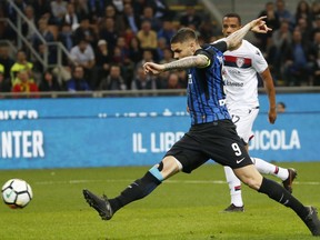 Inter Milan's Mauro Icardi scores his side's second goal during an Italian Serie A soccer match between Inter Milan and Cagliari, at the San Siro stadium in Milan, Italy, Tuesday, April 17, 2018.