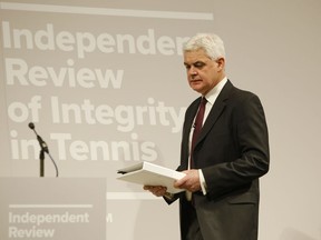 Lawyer Adam Lewis walks to the podium to speak to the media during a press conference at he launch of the Independent Review of Integrity in Tennis interim report in London, Wednesday, April 25, 2018. Lewis is one of three members of the panel along with Beth Wilkinson and Marc Henzelin.