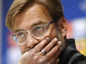 Liverpool manager Jurgen Klopp attends a press conference at Anfield, Liverpool, Britain, Monday, April 23, 2018, on the eve of their Champions League semifinal with AS Roma.