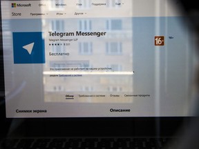 The website of the Telegram messaging app is seen on a computer's screen in Moscow, Russia, Friday, April 13, 2018. A Russian court has ordered the blocking of a popular messaging app following a demand by authorities that it share encryption data with them.