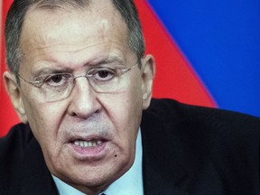 Russian Foreign Minister Sergey Lavrov speaks to the media during a joint news conference after the talks with his Bangladesh counterpart Abul Hassan Mahmud Ali in Moscow, Russia, Monday, April 2, 2018. Lavrov told reporters on Monday that Moscow is concerned that the United States has been "gaining a serious foothold" on the east bank of the Euphrates river despite Trump's earlier promises that the U.S. would leave when the Islamic State group is defeated.