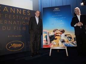 Cannes Film Festival President Pierre Lescure, left, and General Delegate of the Cannes Film Festival Thierry Fremaux pose during a press conference for the presentation of the 71st Cannes film festival, in Paris, Thursday, April 12, 2018.