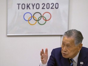 Tokyo 2020 Olympics President Yoshiro Mori speaks during an executive board meeting in Tokyo, Tuesday, April 10, 2018. Tokyo Olympic organizers said the Olympic flame will be put on display at various locations in the Tohoku region to help underscore Japan's recovery from the disaster that took more than 18,000 lives and triggered meltdowns at the Fukushima nuclear power plant.