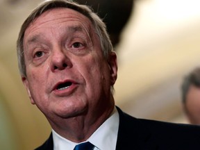 FILE - In this Feb. 13, 2018 file photo, Sen. Dick Durbin, D-Ill., speaks to reporters on Capitol Hill in Washington. The powerful U.S. senator travelled to Venezuela, Wednesday, April 4, 2018, as pressure mounts on President Nicolas Maduro to hand over a Utah man jailed in the turbulent South American country for nearly two years.