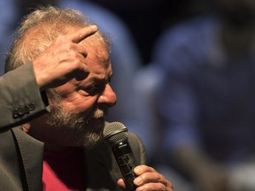 Brazil's former President Luiz Inacio Lula da Silva speaks during his presidential campaign rally with members of his Workers Party and leaders of other left-wing parties in Rio de Janeiro, Brazil, Monday, April 2, 2018. Despite a conviction on corruption charges that could see him barred from running, da Silva is the front runner in that race.