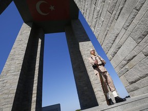 A Turkish soldier, dressed in WWI-era uniform, stands guard during the international service in recognition of the Gallipoli campaign at Mehmetcik monument in the Gallipoli peninsula, Turkey, Tuesday, April 24, 2018. The annual Anzac Day ceremony on April 25 remembers the forces of the Australian and New Zealand Army Corps under British command in World War I who fought a bloody nine-month battle against Turkish forces on the Gallipoli peninsula in 1915. The doomed Allied offensive to secure a naval route from the Mediterranean to Istanbul through the Dardanelles, and take the Ottomans out of the war, resulted in over 130,000 deaths on both sides.