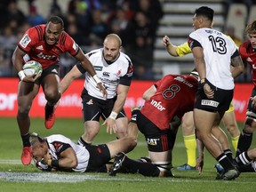 Crusaders Manasa Mataele makes a run during their Super 15 rugby match against the Sunwolves in Christchurch, New Zealand, Saturday, April 21, 2018.