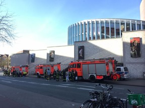 Fire trucks stand in downtown Muenster, Germany, Saturday, April 7, 2018. A vehicle crashed into a crowd Saturday in the western German city of Muenster, killing three people and injuring 20 others. The German news agency dpa has quoted police as saying the driver of that car in Muenster has killed himself.  (dpa via AP)