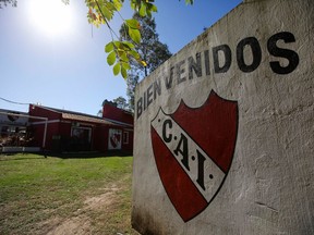 This April 14, 2018 photo, shows the entrance to the youth complex of Independiente soccer club, on the outskirts of Buenos Aires, Argentina. Investigators say that at least 10 minors were prostituted and several other more minors are believed to have been potential victims at the club's youth section. Six men, including a referee, have been arrested in the child prostitution ring at Independiente.