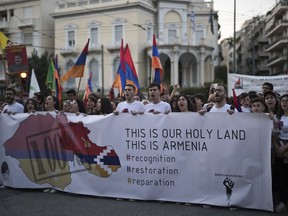 Armenians who live in Greece shout slogans during a protest near the Turkish embassy in Athens, Monday, April 23, 2018. Hundreds of Armenians took part in the protest to commemorate the anniversary of the 1915 mass killing of Armenians in the Ottoman Empire.