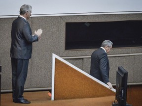 Cuba's new president Miguel Diaz-Canel, right, applauds former president Raul Castro, after Diaz-Canel was elected as the island nation's new president, at the National Assembly in Havana, Cuba, Thursday, April 19, 2018. Castro left the presidency after 12 years in office when the National Assembly approved Diaz-Canel's nomination as the candidate for the top government position.