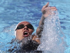 Canada's Kylie Masse competes in her women's 200m backstroke heat at the Aquatic Centre during the 2018 Commonwealth Games on the Gold Coast, Australia, Sunday, April 8, 2018.