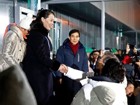 FILE - In this Feb. 9, 2018 file photo, Kim Yo Jong, left, sister of North Korean leader Kim Jong Un, shakes hands with South Korean President Moon Jae-in at the opening ceremony of the 2018 Winter Olympics in Pyeongchang, South Korea. North Korea's abrupt diplomatic outreach in recent months comes after a flurry of weapons tests that marked 2017, including the underground detonation of an alleged thermonuclear warhead and three launches of developmental ICBMs designed to strike the U.S. mainland. Inter-Korean dialogue resumed after Kim in his New Year's speech proposed talks with the South to reduce animosities and for the North to participate in February's Winter Olympics in Pyongchang. North Korea sent hundreds of people to the games, including Kim's sister, who expressed her brother's desire to meet with Moon for a summit. South Korean officials later brokered a potential summit between Kim and Trump.