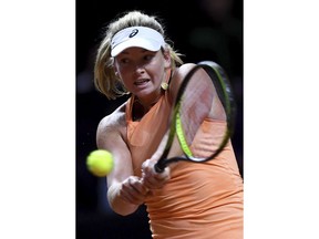 Coco Vandeweghe from the U.S. returns a shot to Czech Republic's Karolina Pliskova  during the final match of the WTA tennis tournament in Stuttgart, Germany, Sunday, April 29, 2018.