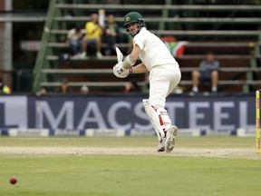 Australia's batsman Pat Cummins watches his shot on day three of the fourth cricket test match between South Africa and Australia at the Wanderers stadium in Johannesburg, South Africa, Sunday, April 1, 2018.