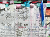 Condolence messages left on Yonge Street for those killed in the van attack in Toronto.