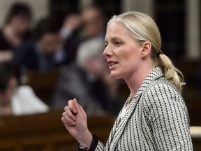 Environment and Climate Change Minister Catherine McKenna stands during question period in the House of Commons on Parliament Hill in Ottawa on Thursday, April 26, 2018.