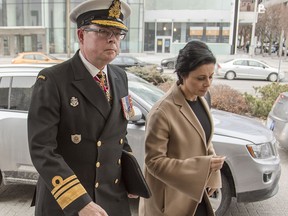 Vice Admiral Mark Norman, left, arrives to an Ottawa court with his lawyer, Marie Henein, Tuesday morning for his first appearance after being charged with one count of breach of trust.
