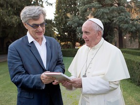 Pope Francis, right, with director Wim Wenders during the filming of the documentary "Pope Francis: A Man Of His Word."