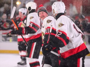 In this Dec. 15, 2017 file photo, former Ottawa Senators captain Daniel Alfredsson skates in the team's alumni game at the NHL 100 Classic on Parliament Hill.