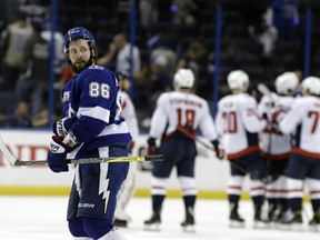 Tampa Bay Lightning right wing Nikita Kucherov leaves the ice as the Washington Capitals celebrate their 6-2 win during Game 2 of the Eastern Conference final on Sunday, May 13, 2018, in Tampa, Fla.