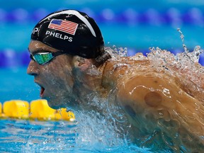 In this Aug. 9, 2016 file photo, Michael Phelps competes in the men's 200m butterfly final at the Rio Olympics.