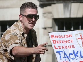English Defence League (EDL) leader Tommy Robinson speaks to supporters during a rally outside Downing Street on May 27, 2013 in London, England.