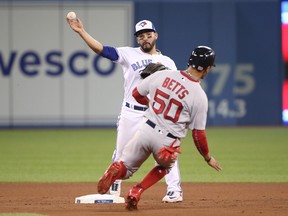 The Toronto Blue Jays have recalled Devon Travis from the minor leagues.