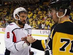 Capitals captain Alex Ovechkin shakes hands with Pittsburgh's Evgeni Malkin after Game 6.