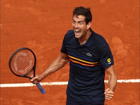 Guillermo Garcia-Lopez of Spain celebrates victory over Stan Wawrinka in the first round of the 2018 French Open on May 28, 2018 in Paris.