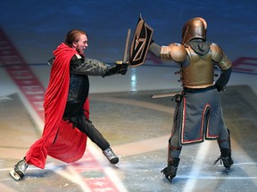 Lee Orchard as the Golden Knight, right, battles Zack Frongillo representing the Washington Capitals during the pregame show before Game 1 of the 2018 Stanley Cup final on May 28, 2018 in Las Vegas.