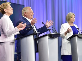 Kathleen Wynne, Doug Ford and Andrea Horwath at the Ontario leaders' debate on May 27, 2018.