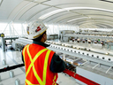 Aecon Construction worker at Toronto Pearson International Airport.