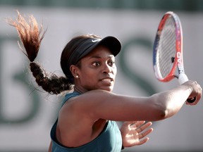 Sloane Stephens plays a forehand return to Poland's Madgalena Frech during their second-round match at the 2018 French Open.