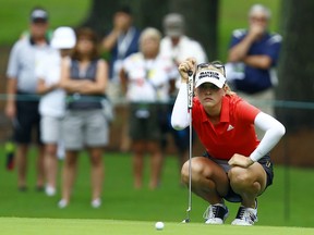 Jessica Korda prepares to putt on the 11th green during the first round of the U.S. Women's Open golf tournament, Thursday, May 31, 2018, in Shoal Creek, Ala.
