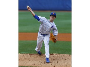 Florida pitcher Tommy Mace (47) throws a pitch during the first inning of a Southeastern Conference tournament NCAA college baseball game against LSU, Wednesday, May 23, 2018, in Hoover, Ala.