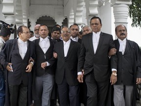 Lawyer supporting opposition Bangladesh Nationalist Party (BNP) leave the Supreme Court after the court upheld a High Court's decision to grant bail to opposition leader and former Prime Minister Khaleda Zia in Dhaka, Bangladesh, Wednesday, May 16, 2018. Zia, was jailed for five years on a corruption conviction.