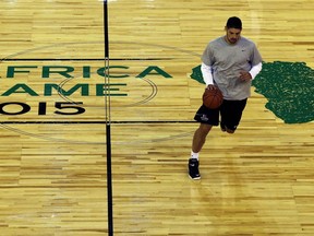 FILE - In this Friday, July 31, 2015 file photo, NBA player Nikola Vucevic of the Orlando Magic dribbles the ball during the practice for the NBA Africa Game at Ellis Park Arena in Johannesburg, South Africa. The NBA will hold its Africa exhibition game in the South African capital Pretoria on Aug. 4. The announcement was made Thursday, May 31, 2018 by NBA vice president and managing director for Africa Amadou Gallo Fall.