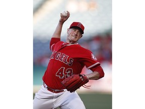 Los Angeles Angels starting pitcher Garrett Richards throws to a Houston Astros batter during the first inning of a baseball game Wednesday, May 16, 2018, in Anaheim, Calif.