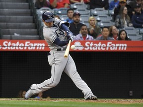 Tampa Bay Rays' Daniel Robertson hits a grand slam during the second inning of a baseball game against the Los Angeles Angels Saturday, May 19, 2018, in Anaheim, Calif.