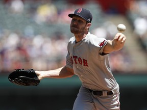 Boston Red Sox starting pitcher Chris Sale delivers to the Texas Rangers during the first inning of a baseball game, Sunday, May 6, 2018, in Arlington, Texas.