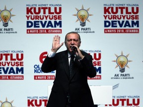 Turkey's President Recep Tayyip Erdogan talks to his supporters, presenting his alliance's election strategy in Istanbul, Sunday, May 6, 2018.