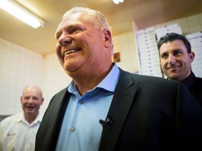 Ontario PC leader Doug Ford makes an announcement at Capri Pizza during a campaign stop in Cambridge, Ont., on Thursday, May 17, 2018.